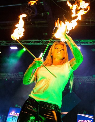 TJ Hynd juggling batons during her Fire Show
