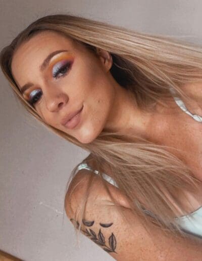 Lola make-up and long blonde hair